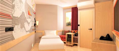 A modern hotel room with a large bed, a desk, a chair, a wardrobe, and a wall with a circuit board design.