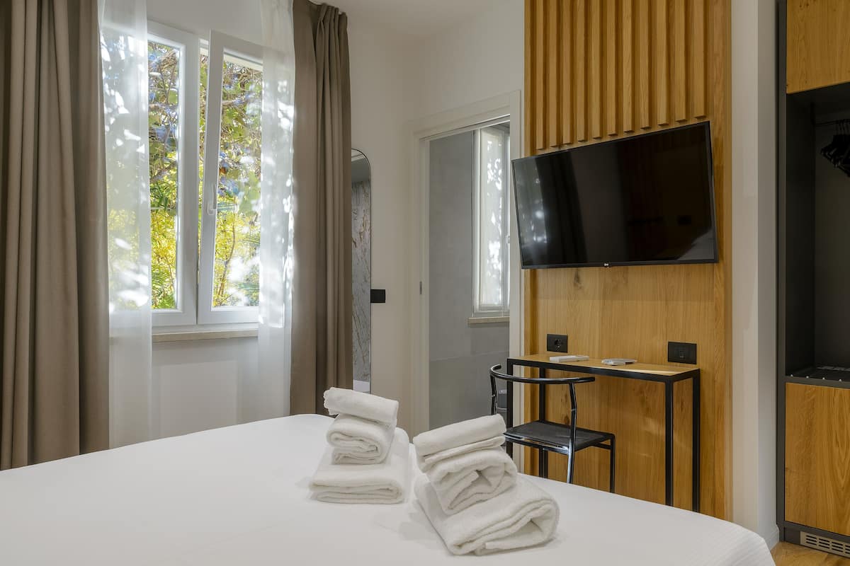 Superior Room, 1 Queen Bed, Patio, Garden View | 1 bedroom, hypo-allergenic bedding, down duvets, memory-foam beds