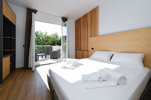 Hypo-allergenic bedding, down comforters, memory foam beds, in-room safe