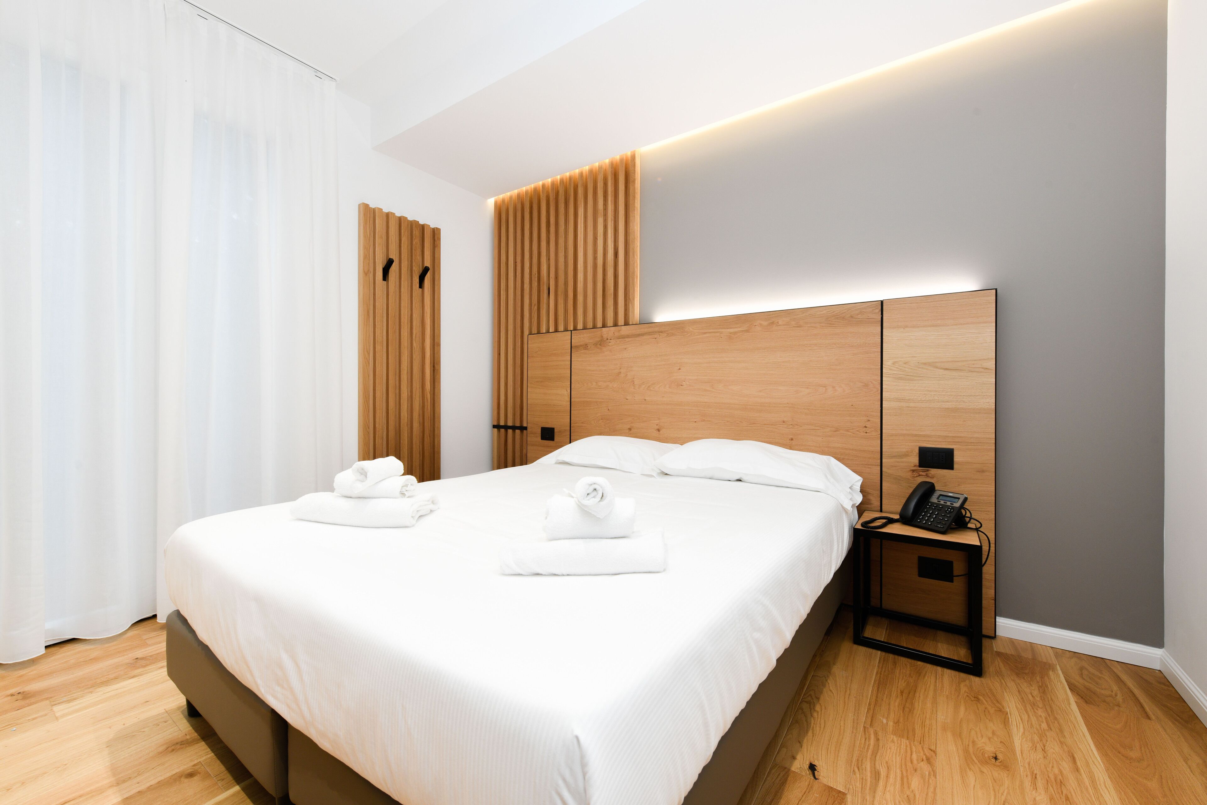 Comfort Quadruple Room | Hypo-allergenic bedding, down comforters, memory foam beds, in-room safe