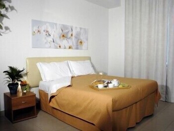 Desk, blackout curtains, iron/ironing board, free cots/infant beds