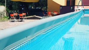 Seasonal outdoor pool, pool umbrellas, sun loungers