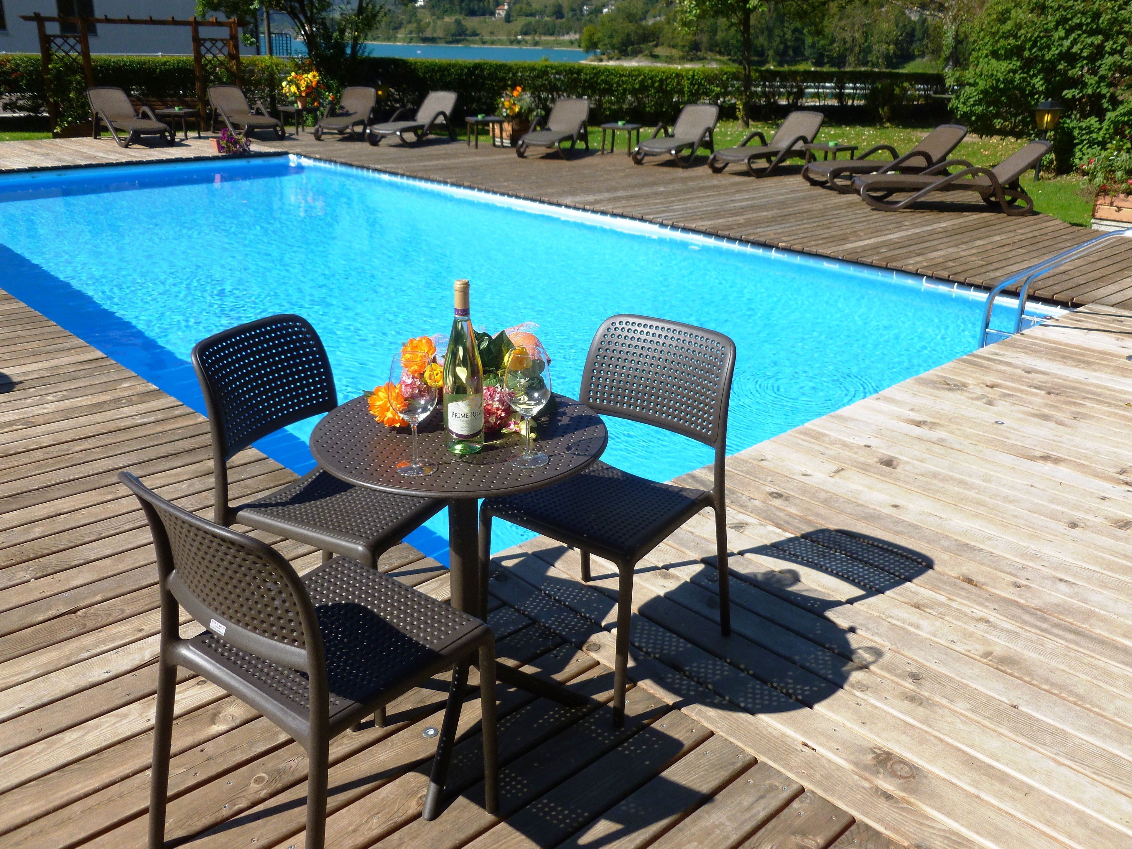 outdoor pool, pool loungers