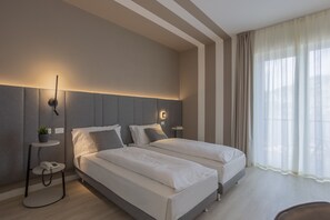 Habitación Deluxe | Caja fuerte, wifi gratis, ropa de cama