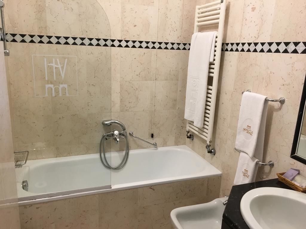 hair dryer, bidet, towels, soap