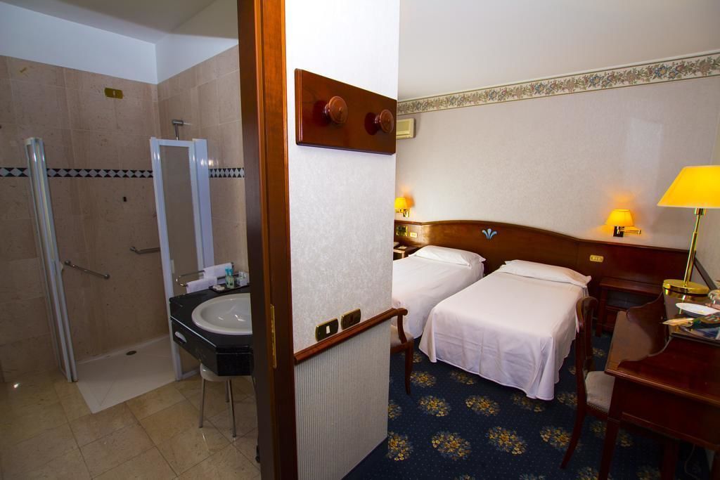 hair dryer, bidet, towels, soap