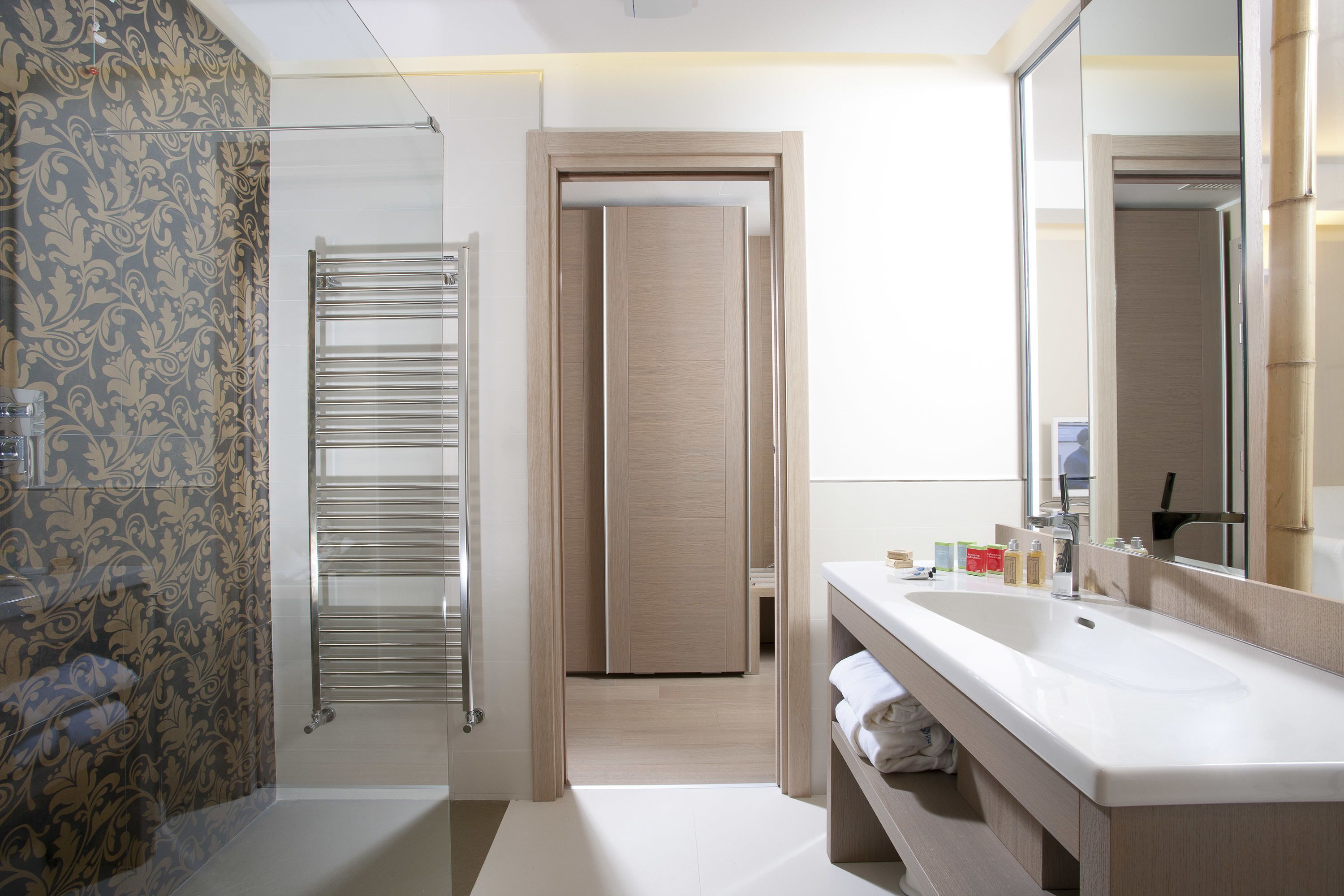 executive double room, sea view (beach access included) | bathroom | shower, designer toiletries, hair dryer, slippers