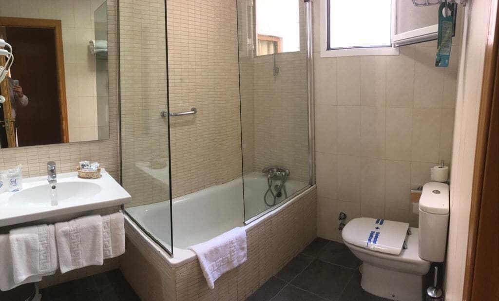 bathtub, free toiletries, hair dryer, bidet