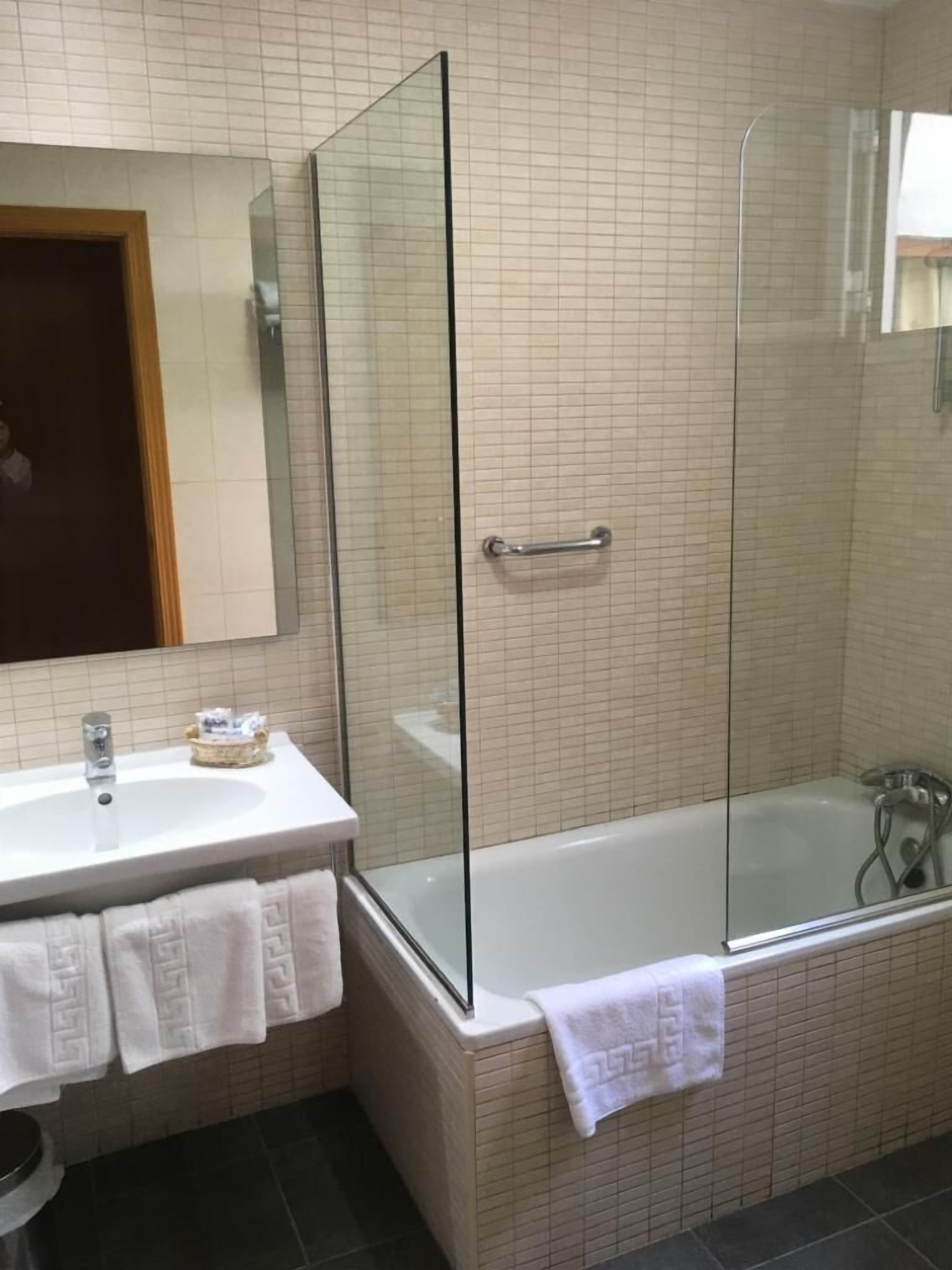 bathtub, free toiletries, hair dryer, bidet