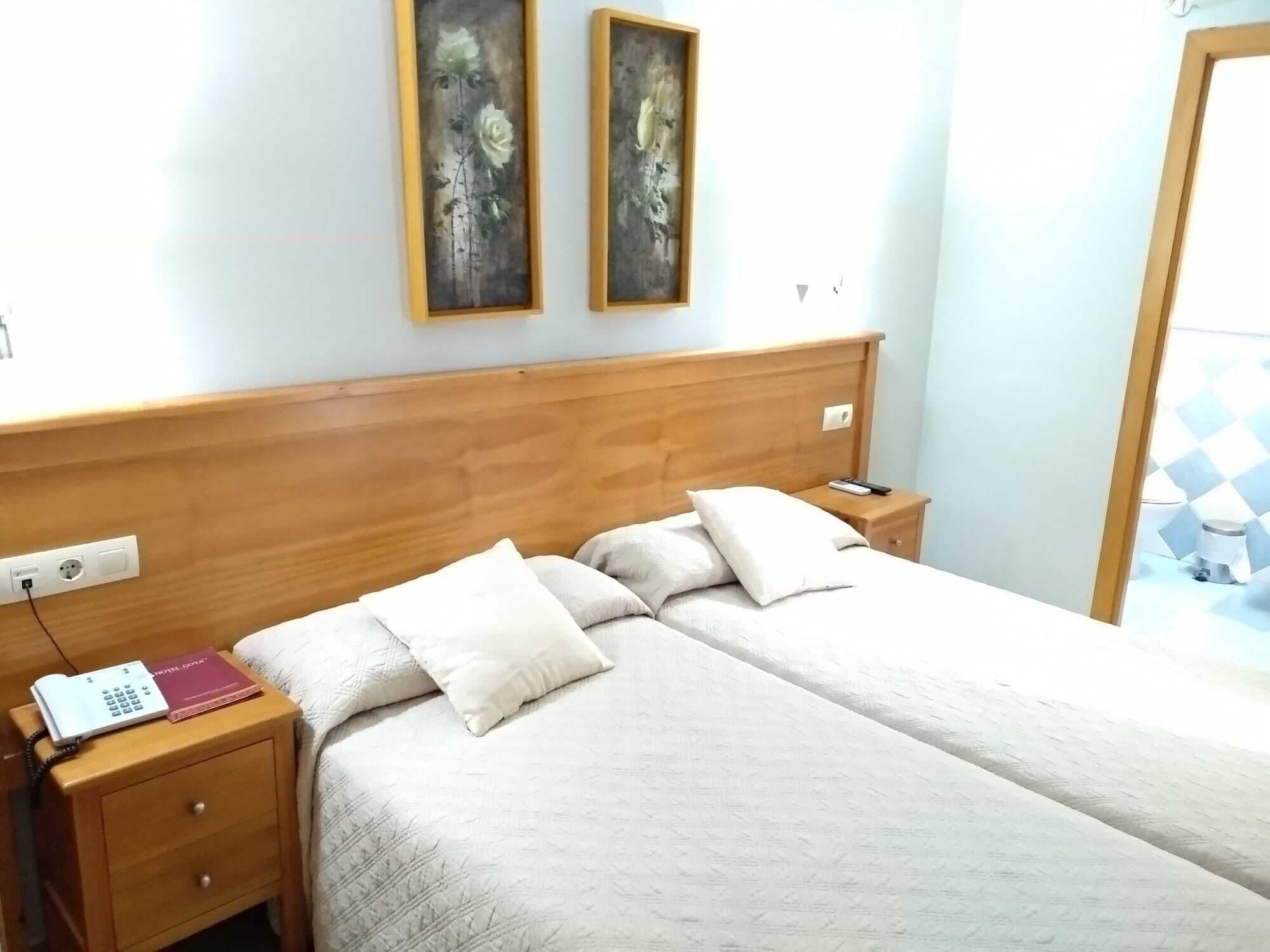 twin room | down duvets, in-room safe, individually decorated