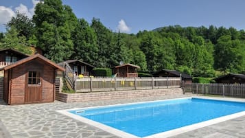 Seasonal outdoor pool, open 10:00 AM to 7:00 PM, sun loungers