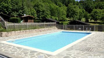 Seasonal outdoor pool, open 10:00 AM to 7:00 PM, sun loungers