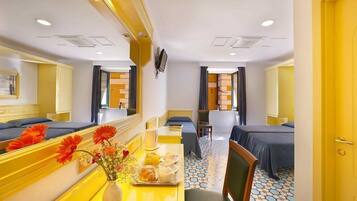 Classic Triple Room | Minibar, in-room safe, desk, soundproofing