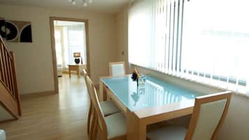 40-inch flat-screen TV with satellite channels, TV, DVD player