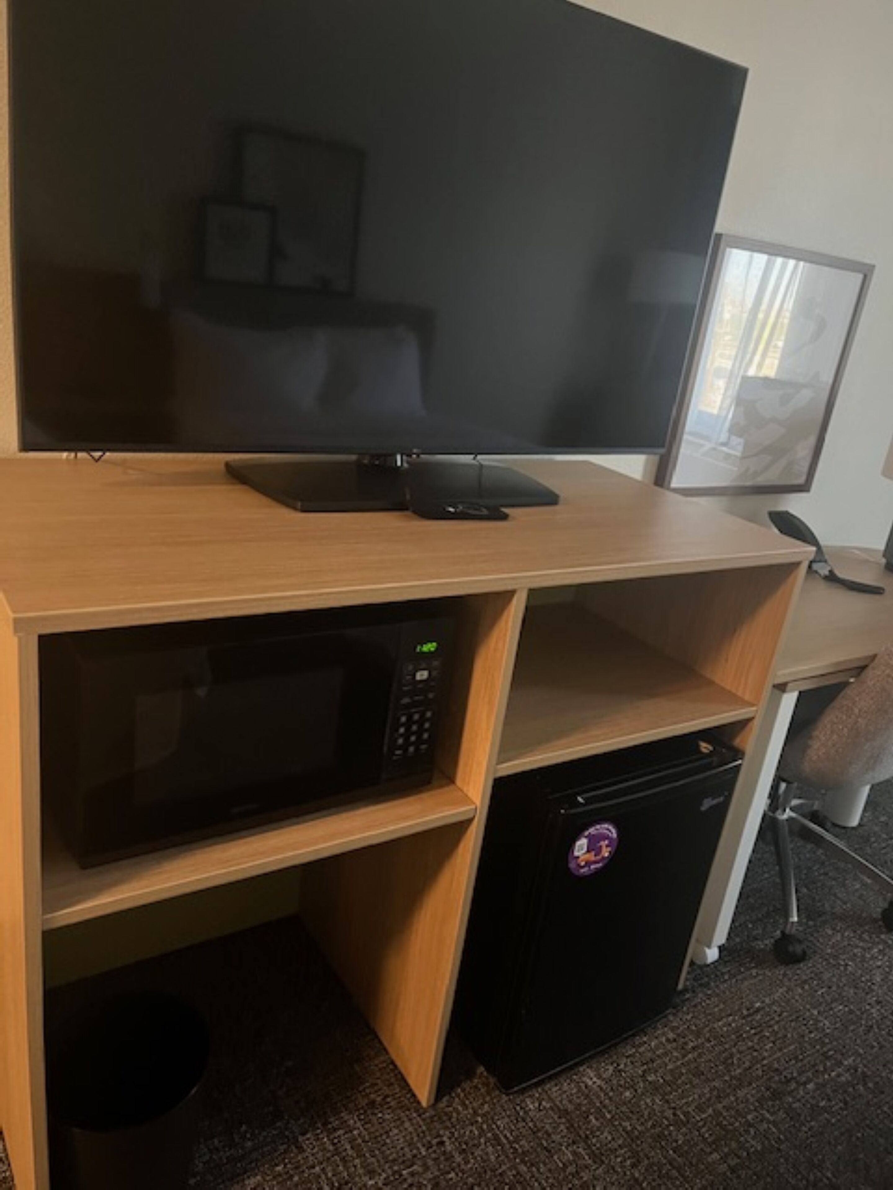 premium bedding, laptop workspace, blackout curtains, iron/ironing board