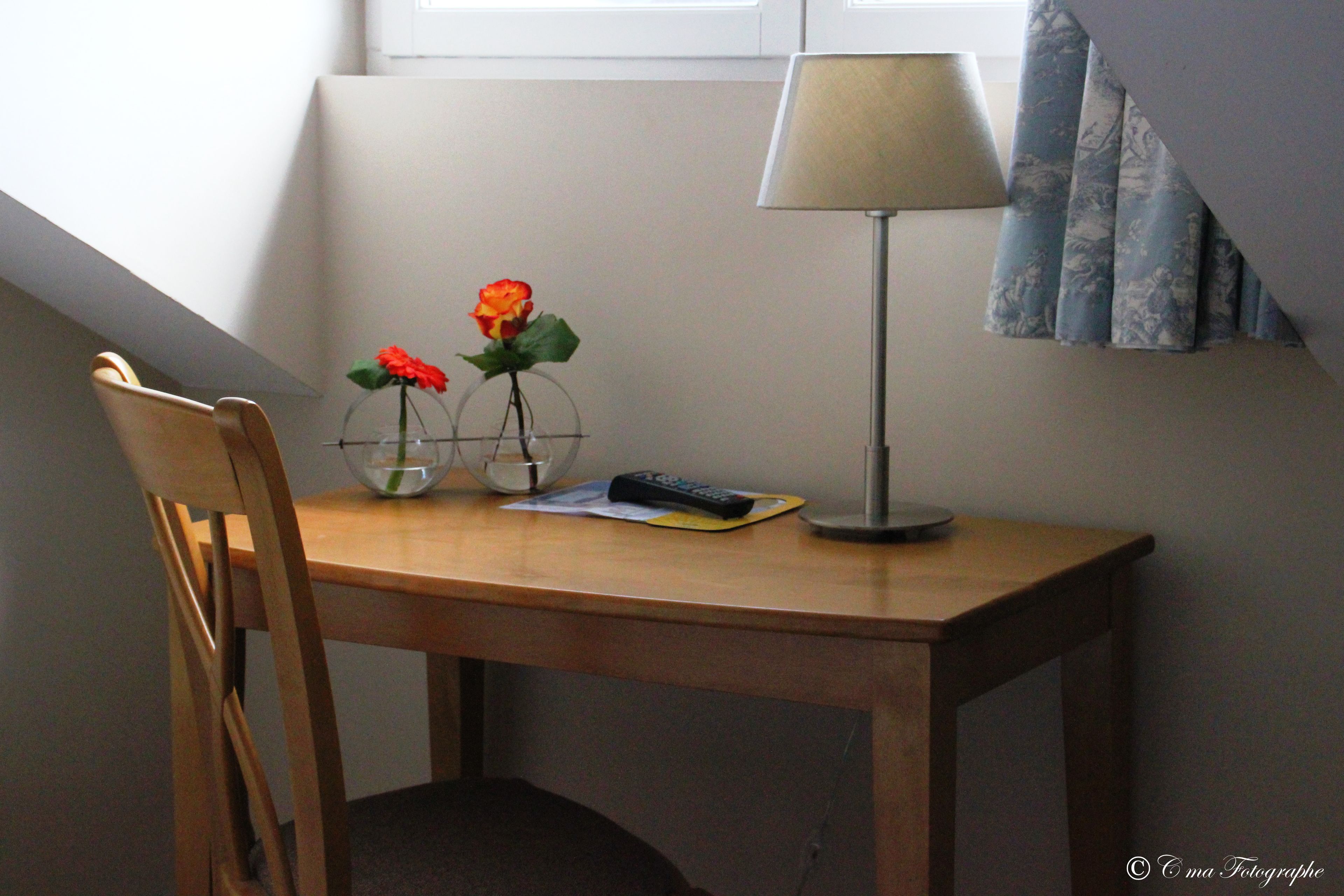 desk, blackout curtains, soundproofing, rollaway beds