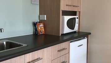 Fridge, microwave, coffee/tea maker, electric kettle
