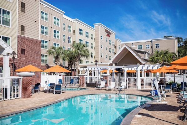 Outdoor pool, open 9 AM to 10 PM, pool umbrellas, pool loungers