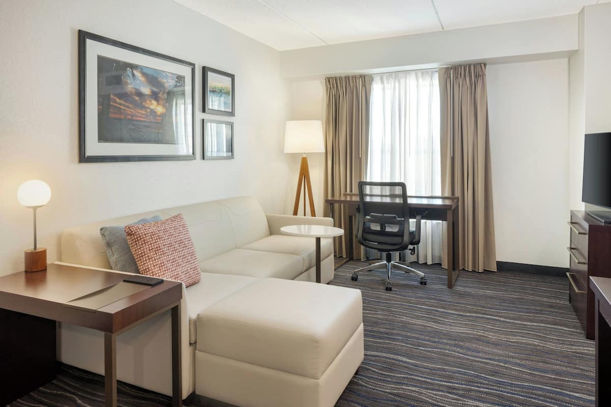 Studio, 1 King Bed with Sofa bed | Living area | 55-inch Smart TV with digital channels, TV, Netflix