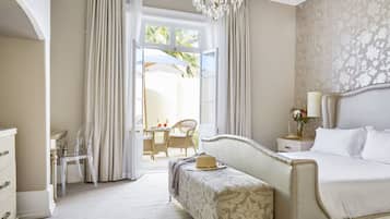 Luxury Suite, 1 King Bed | Minibar, individually decorated, individually furnished, desk