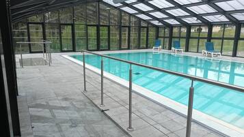 Indoor pool, outdoor pool, pool umbrellas, sun loungers