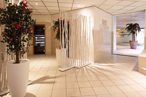 Indoor pool, open 7 AM to 9 PM, sun loungers