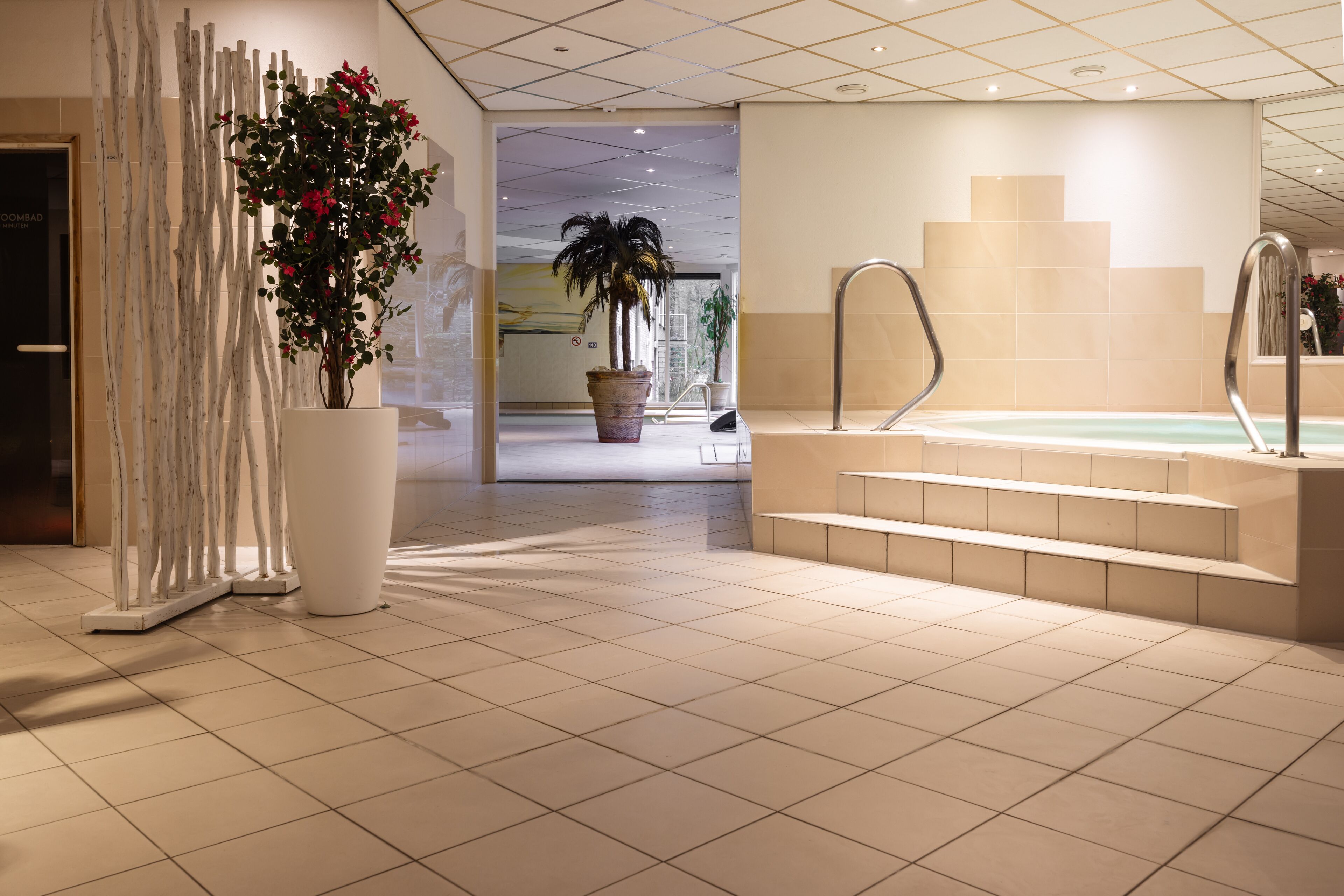 Indoor pool, open 7 AM to 9 PM, sun loungers
