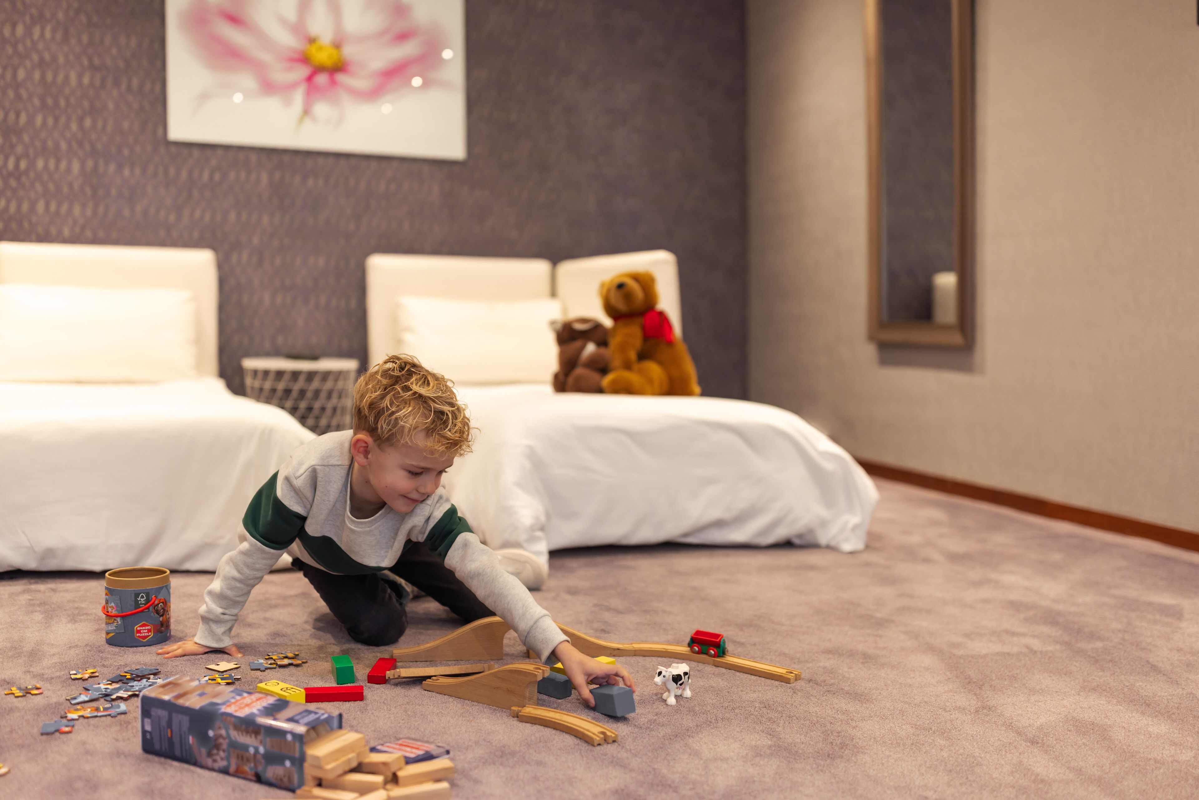 family room | 1 bedroom, minibar, in-room safe, desk