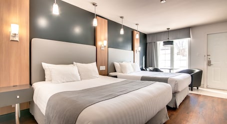 Deluxe Room, 2 Queen Beds, Ground Floor | Desk, blackout drapes, soundproofing, iron/ironing board