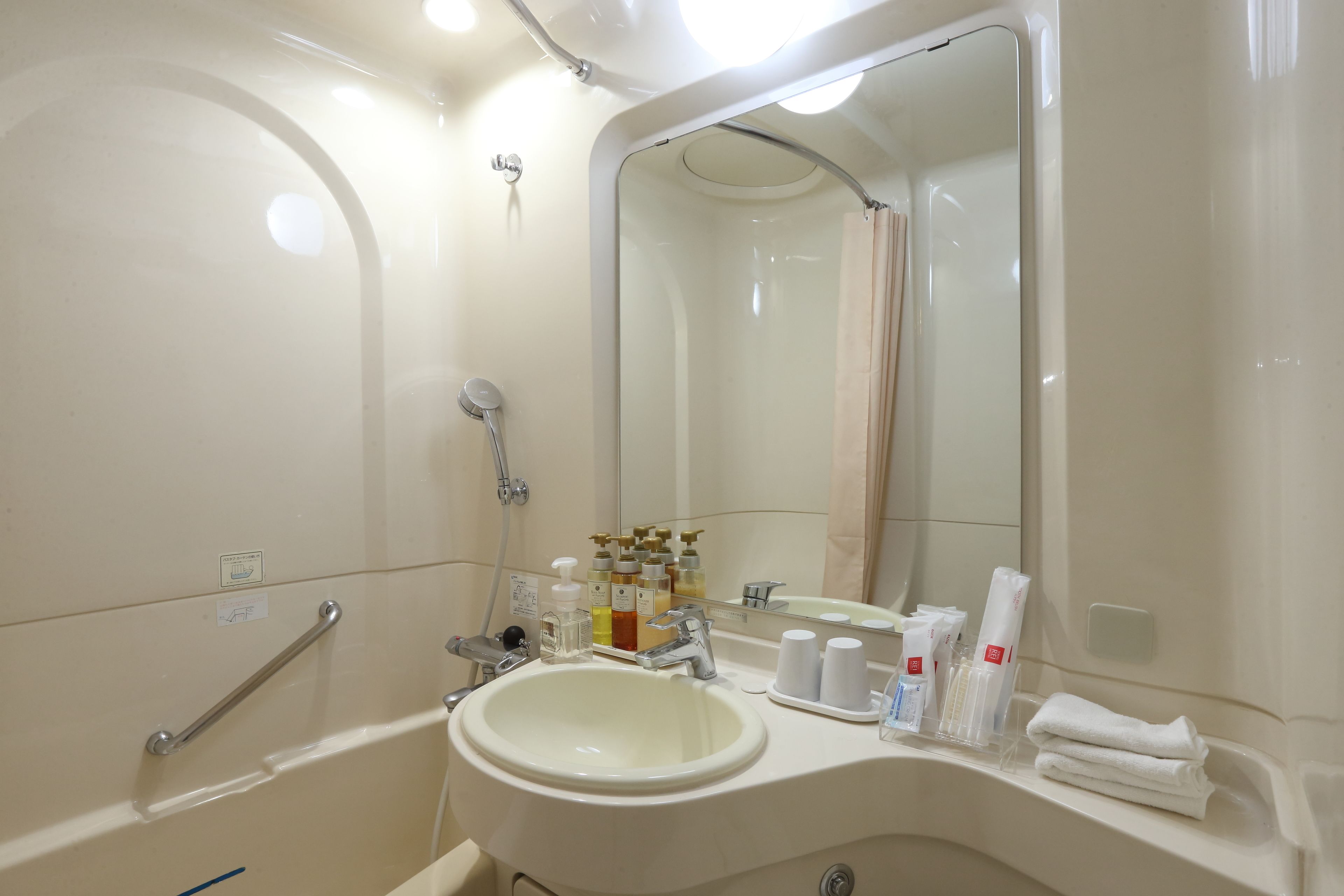 combined shower/bathtub, free toiletries, hair dryer, bathrobes