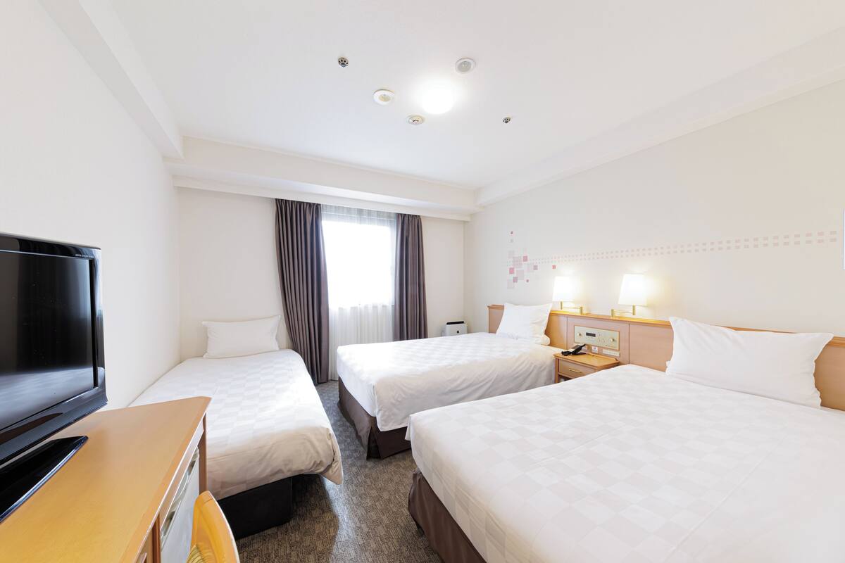 Premium bedding, down duvets, in-room safe, desk