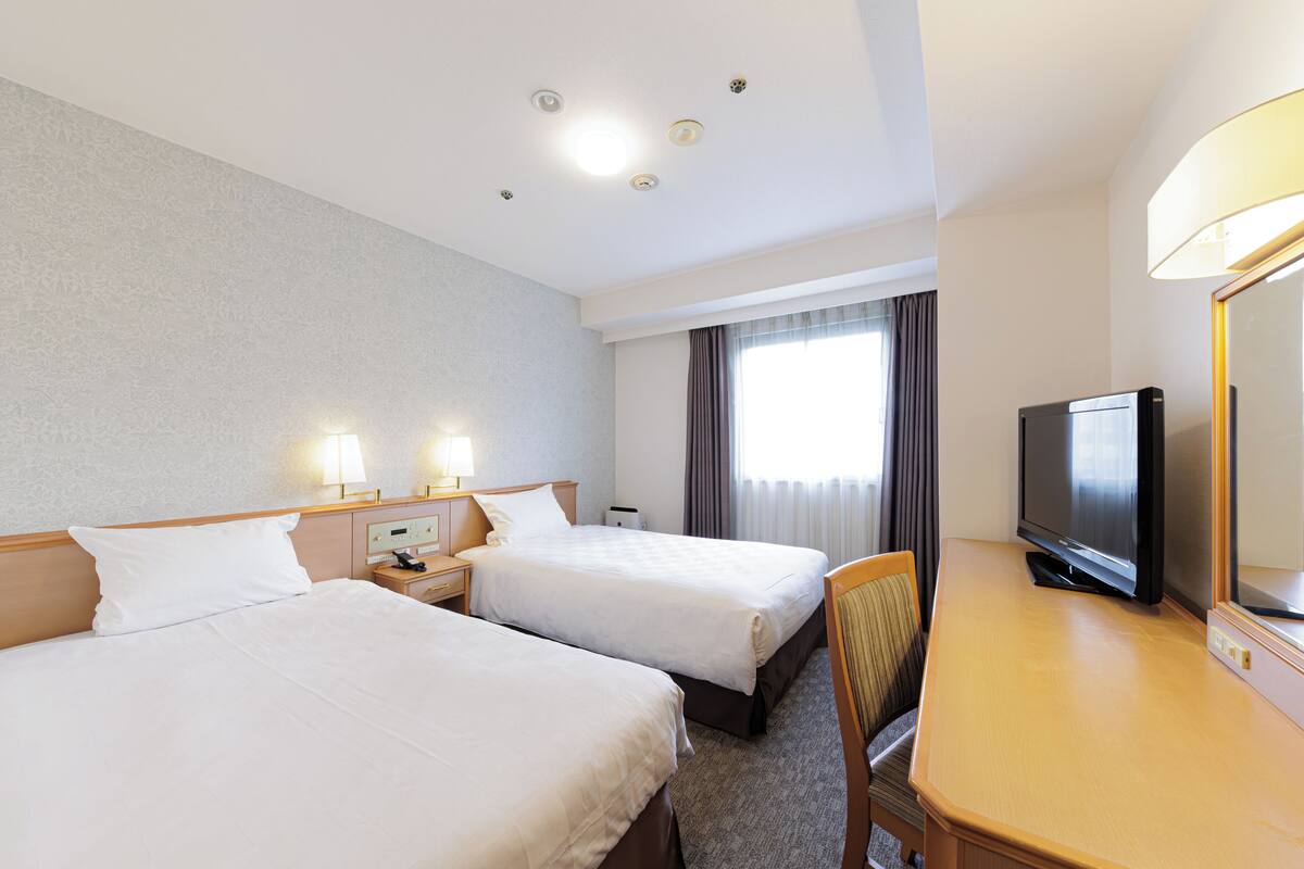 Premium bedding, down duvets, in-room safe, desk