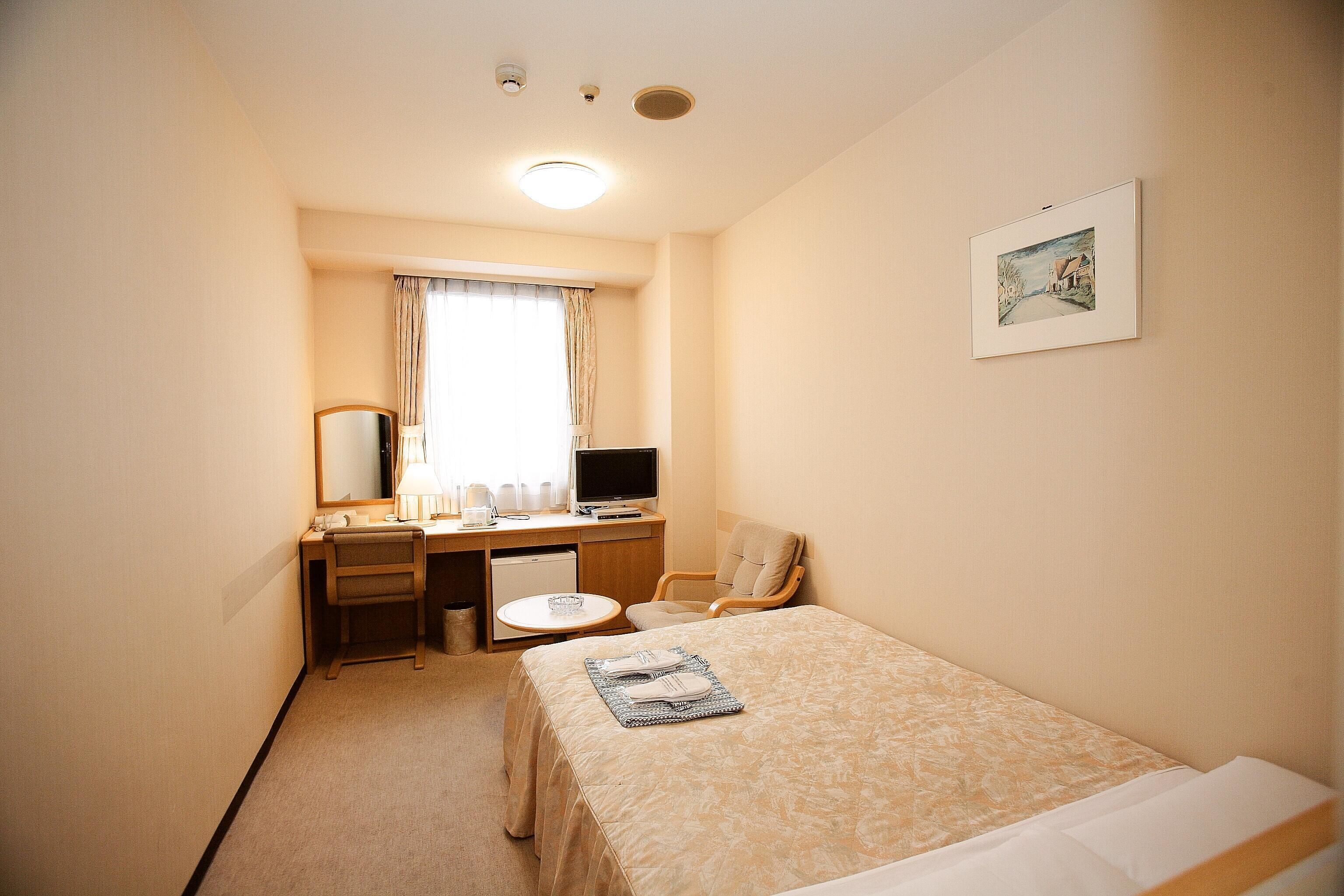 down duvets, desk, blackout curtains, iron/ironing board