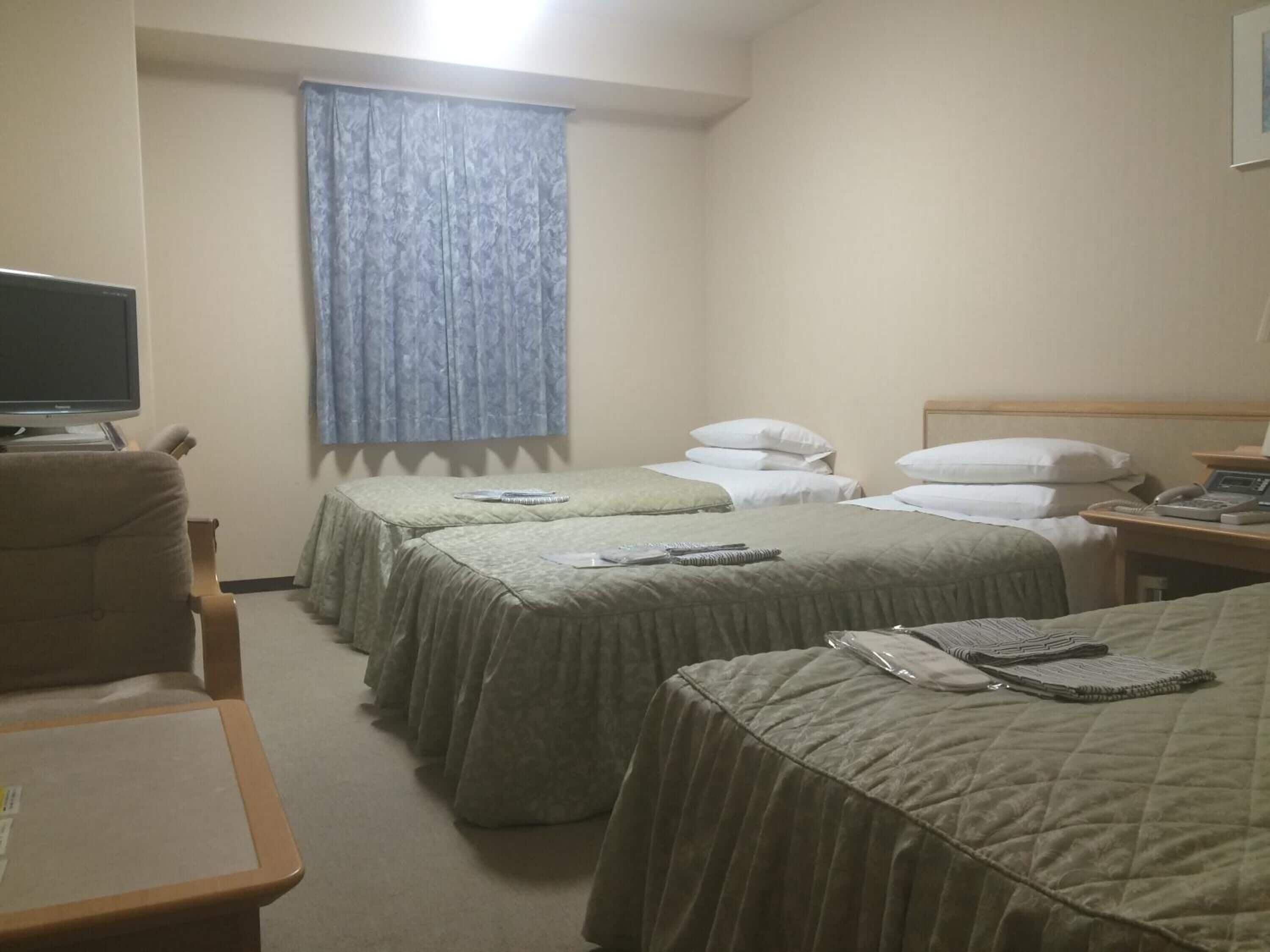 down duvets, desk, blackout curtains, iron/ironing board