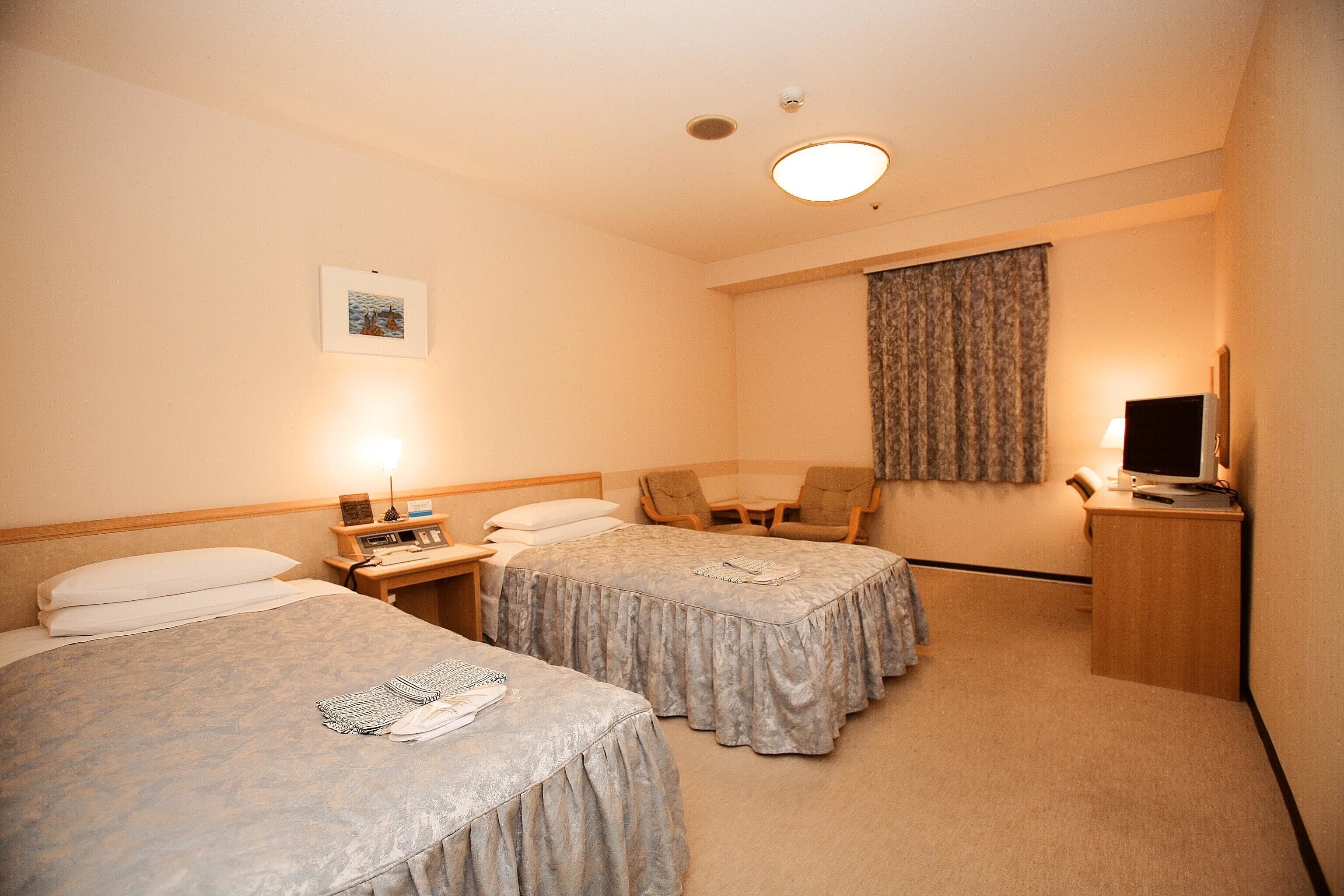 down duvets, desk, blackout curtains, iron/ironing board