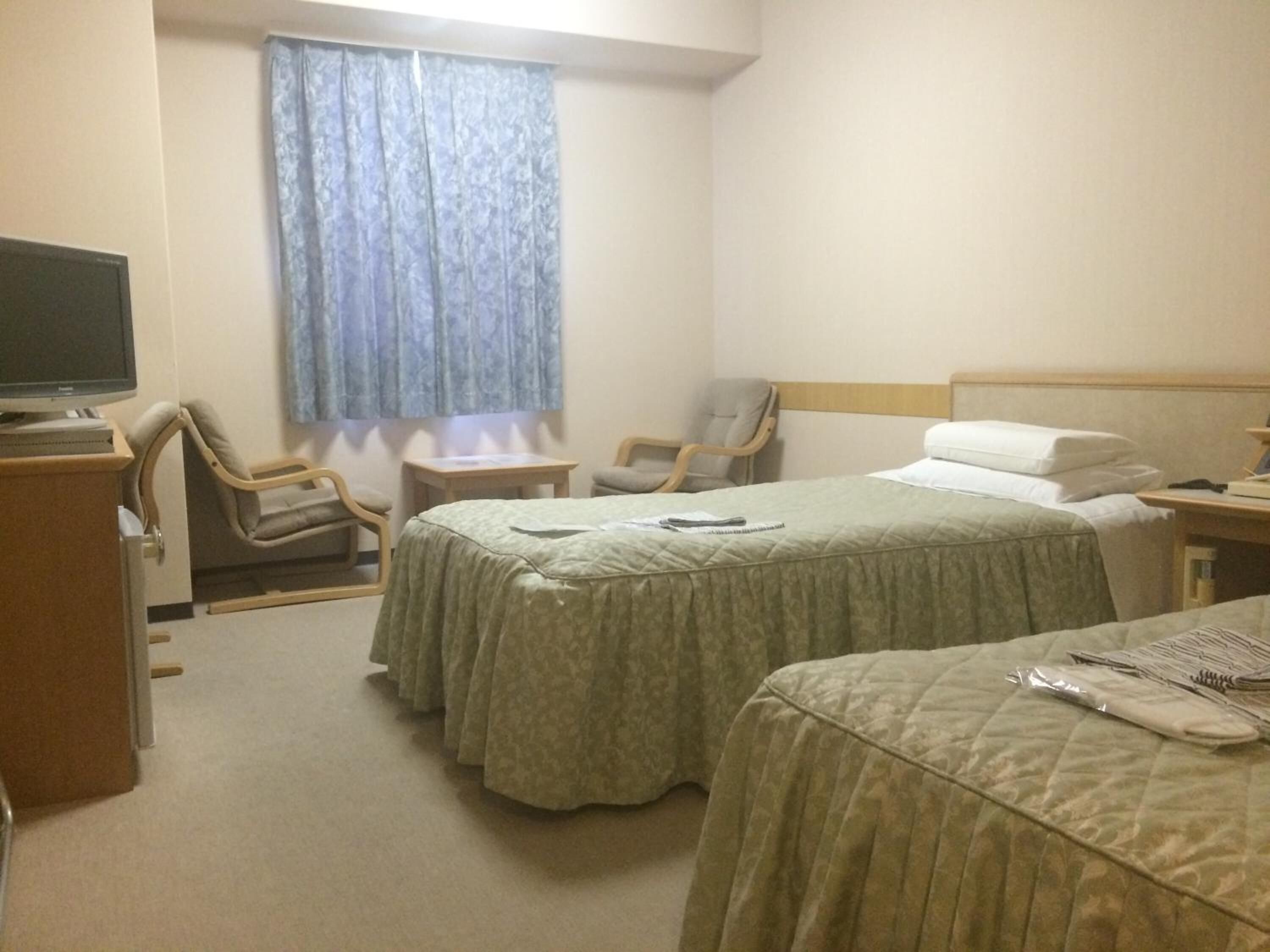 down duvets, desk, blackout curtains, iron/ironing board