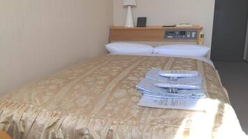 Down comforters, desk, blackout drapes, iron/ironing board