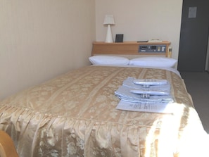 Down comforters, desk, blackout drapes, iron/ironing board
