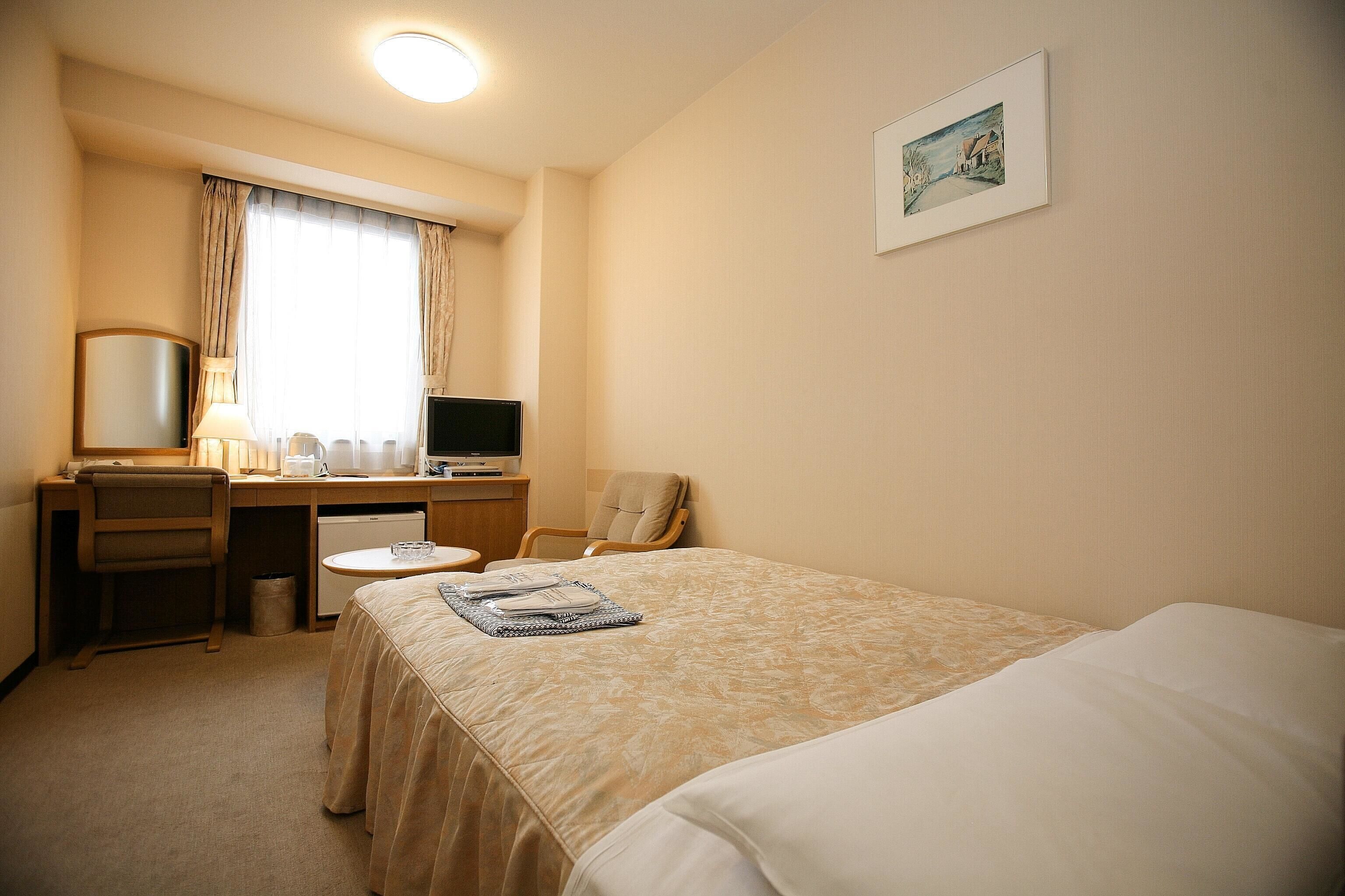 down duvets, desk, blackout curtains, iron/ironing board