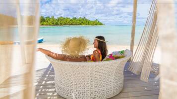 On the beach, white sand, free beach cabanas, sun loungers