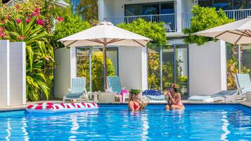 Outdoor pool, free cabanas, pool umbrellas