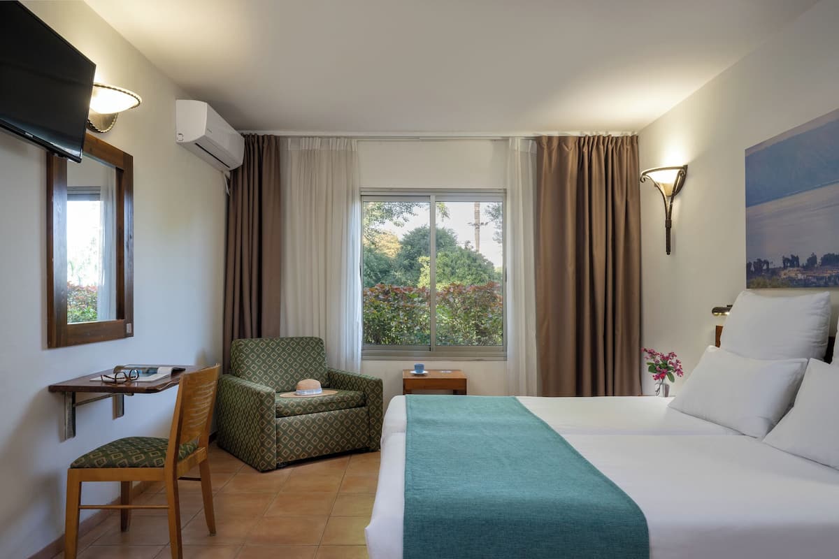 Superior Room, Garden Area | Minibar, in-room safe, desk, blackout drapes