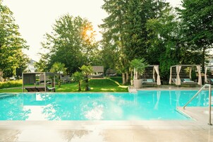 Indoor pool, outdoor pool, pool umbrellas, sun loungers