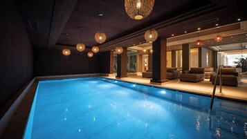 Indoor pool, outdoor pool, pool umbrellas, sun loungers