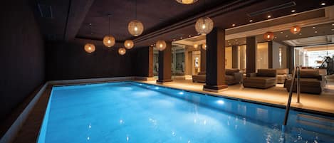Indoor pool, outdoor pool, pool umbrellas, sun loungers