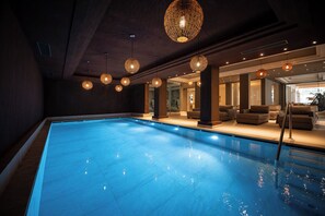 Indoor pool, outdoor pool, pool umbrellas, pool loungers