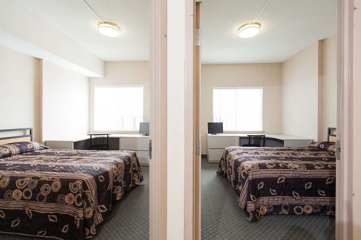 Suite, 2 Bedrooms | Desk, iron/ironing board, free WiFi, bed sheets