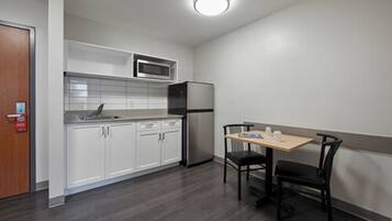Suite, 2 Bedrooms | Private kitchenette | Full-sized fridge, microwave