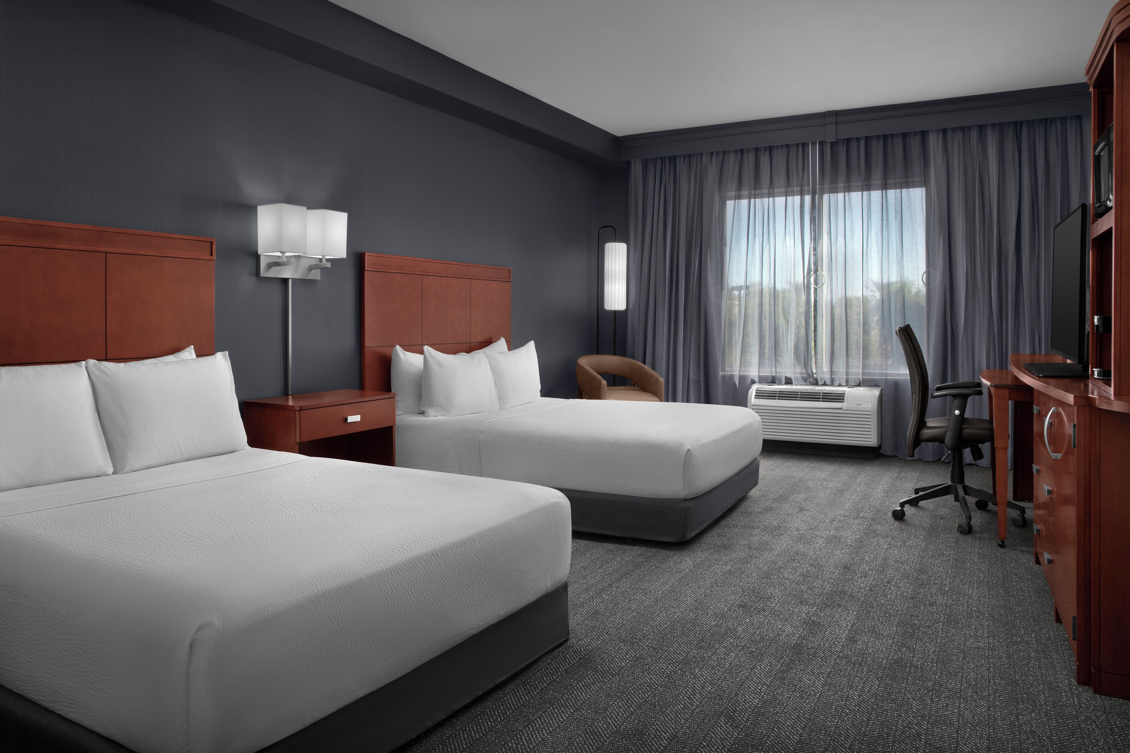 Hypo-allergenic bedding, in-room safe, desk, laptop workspace