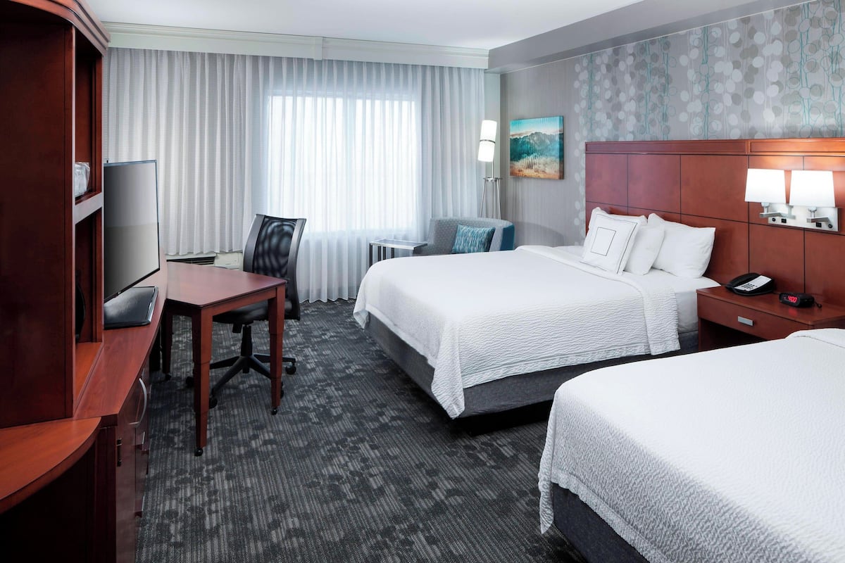 Hypo-allergenic bedding, in-room safe, desk, laptop workspace